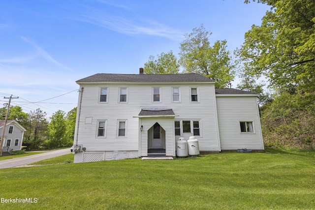 203 Main St, Hancock, MA 01237 - view of front facade with a front yard, a chimney, and a shingled roof