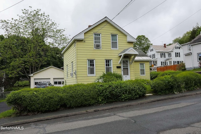 55 Franklin St, North Adams, MA 01247 - traditional-style house featuring a detached garage and a chimney