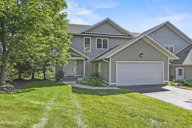 12 Alpine Trl Unit 12, Pittsfield, MA 01201 - view of front facade featuring driveway, a front lawn, and roof with shingles