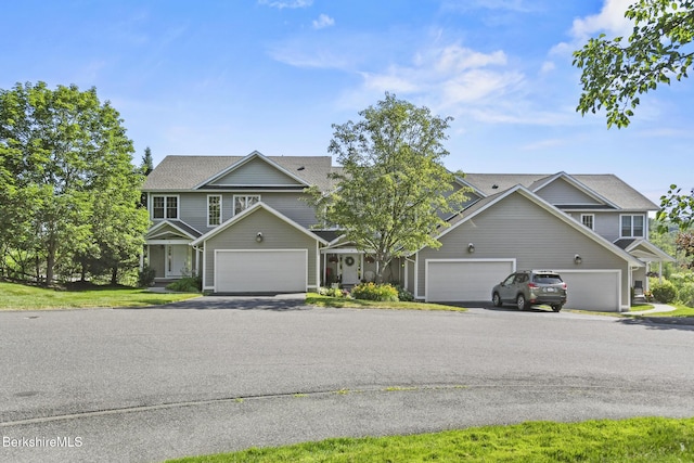 12 Alpine Trl Unit 12, Pittsfield, MA 01201 - view of front of property with a garage and asphalt driveway