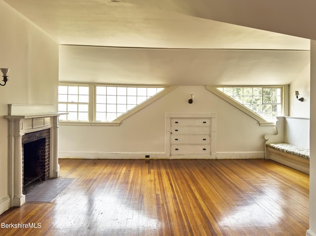 319 Under Mountain Rd, Lenox, MA 01240 - unfurnished living room with hardwood / wood-style floors and a fireplace