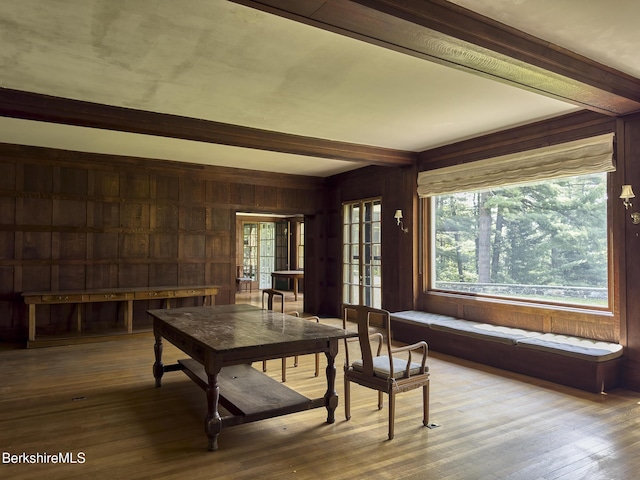 319 Under Mountain Rd, Lenox, MA 01240 - dining space featuring wooden walls, beamed ceiling, and wood-type flooring
