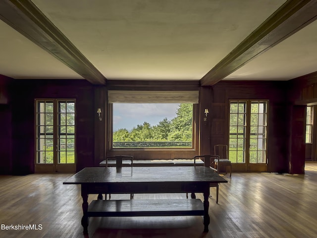 319 Under Mountain Rd, Lenox, MA 01240 - dining room with beamed ceiling, wood finished floors, and wood walls