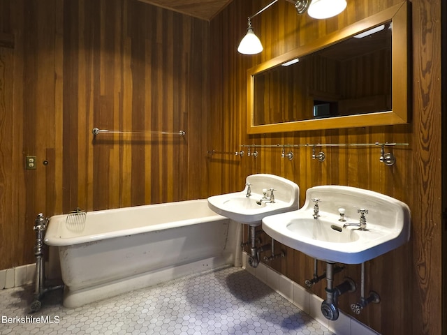 319 Under Mountain Rd, Lenox, MA 01240 - full bathroom featuring a tub and wood walls