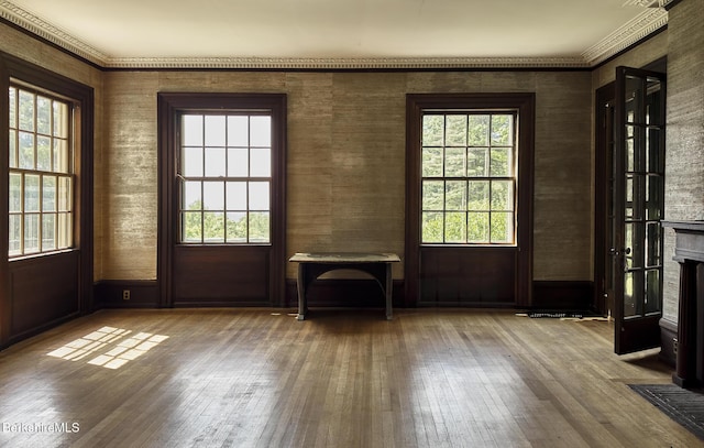 319 Under Mountain Rd, Lenox, MA 01240 - entryway with wood-type flooring and a fireplace with flush hearth