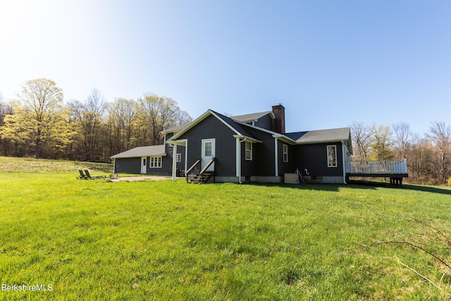 147 Brough Rd, Cheshire, MA 01225 - back of property featuring a deck, a yard, a chimney, and entry steps