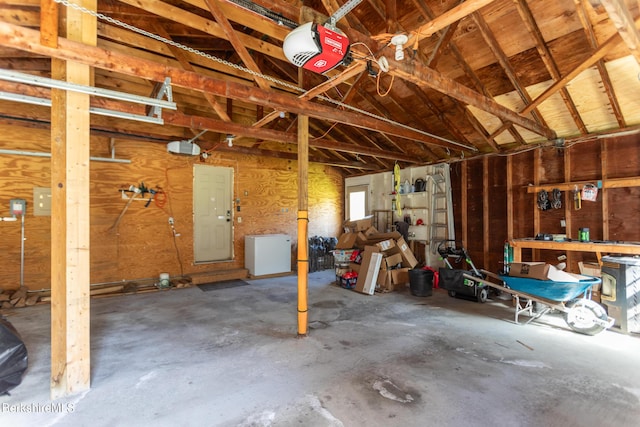 147 Brough Rd, Cheshire, MA 01225 - garage with a workshop area and a garage door opener