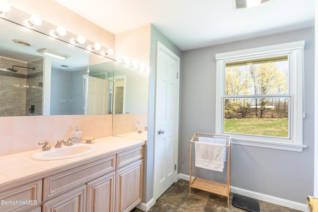 147 Brough Rd, Cheshire, MA 01225 - full bathroom featuring a tile shower, vanity, baseboards, decorative backsplash, and visible vents