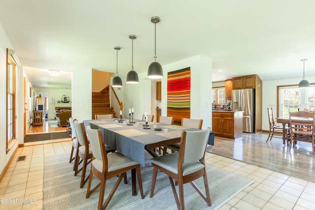 147 Brough Rd, Cheshire, MA 01225 - dining room with stairway, light tile patterned floors, baseboards, and visible vents