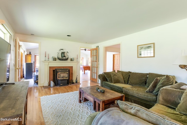 147 Brough Rd, Cheshire, MA 01225 - living room featuring a brick fireplace and light wood-style floors