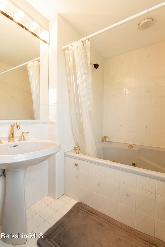 147 Brough Rd, Cheshire, MA 01225 - bathroom featuring a combined bath / shower with jetted tub, tile patterned floors, and tile walls