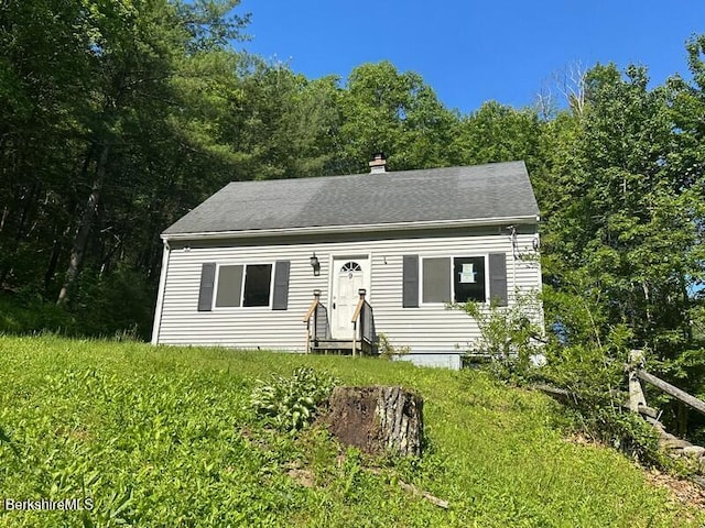9 Woronoco Rd, Blandford, MA 01008 - view of front of property featuring a chimney and entry steps