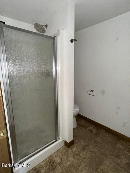 9 Woronoco Rd, Blandford, MA 01008 - bathroom with a shower stall and toilet