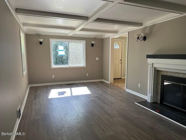 9 Woronoco Rd, Blandford, MA 01008 - unfurnished living room featuring a fireplace, wood finished floors, coffered ceiling, and beamed ceiling