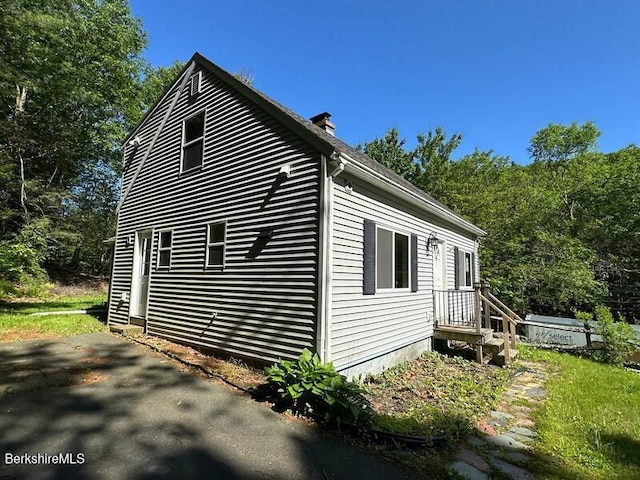 9 Woronoco Rd, Blandford, MA 01008 - view of property exterior with a patio area