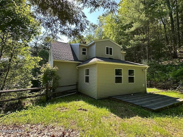 9 Woronoco Rd, Blandford, MA 01008 - back of house with a deck and roof with shingles