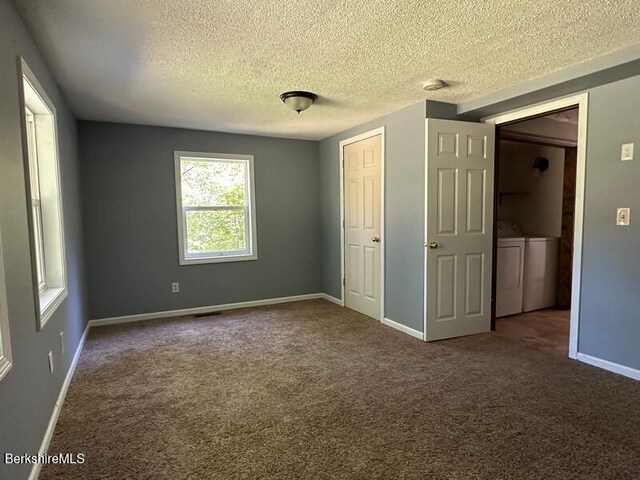 9 Woronoco Rd, Blandford, MA 01008 - unfurnished bedroom with washer and dryer, a textured ceiling, and carpet flooring