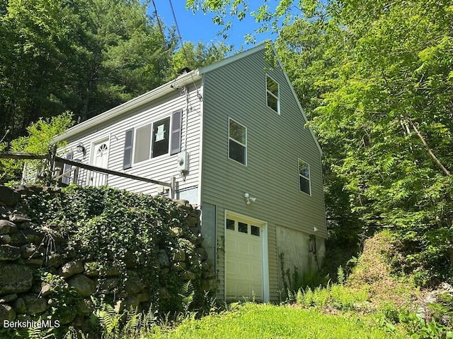 9 Woronoco Rd, Blandford, MA 01008 - view of side of property featuring an attached garage