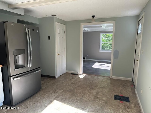 9 Woronoco Rd, Blandford, MA 01008 - kitchen featuring stainless steel refrigerator with ice dispenser and baseboards