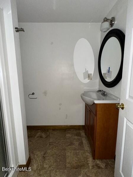 9 Woronoco Rd, Blandford, MA 01008 - bathroom with vanity and baseboards