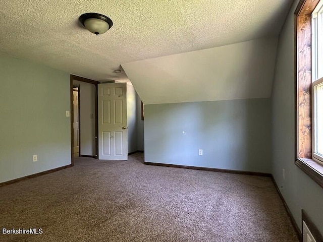 9 Woronoco Rd, Blandford, MA 01008 - additional living space with carpet floors and a textured ceiling