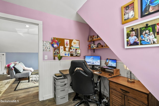 office area featuring a wainscoted wall and wood finished floors