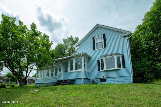 7 Hughes St, Adams, MA 01220 - back of property featuring a lawn and entry steps
