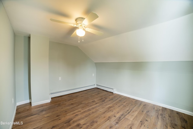 7 Hughes St, Adams, MA 01220 - bonus room with a baseboard heating unit, wood finished floors, ceiling fan, and vaulted ceiling