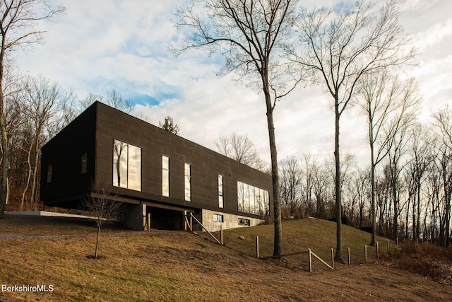 view of home's exterior featuring a yard