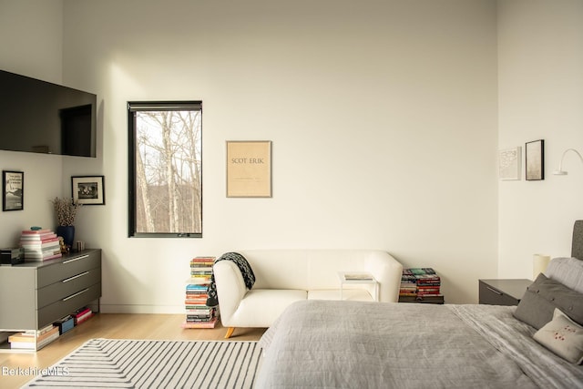 bedroom with light wood-type flooring