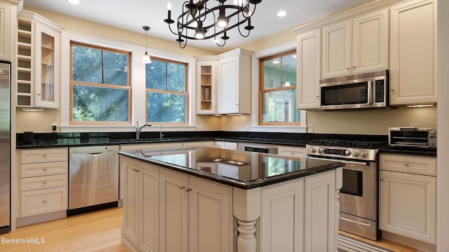 11 Jamie Ln, Sandisfield, MA 01255 - kitchen with appliances with stainless steel finishes, recessed lighting, a chandelier, glass insert cabinets, and pendant lighting