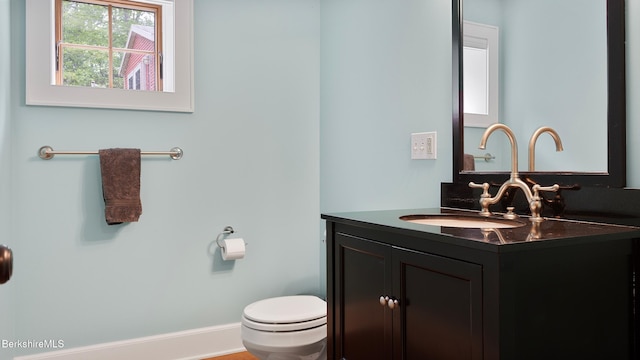 11 Jamie Ln, Sandisfield, MA 01255 - bathroom with vanity, toilet, and baseboards