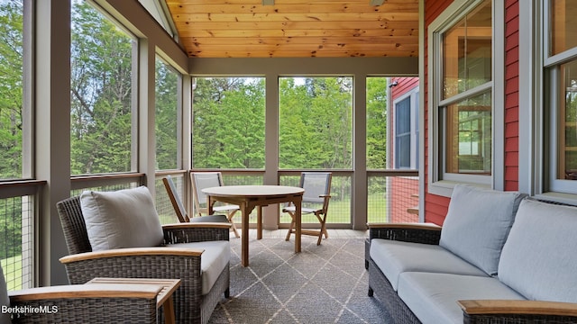 11 Jamie Ln, Sandisfield, MA 01255 - sunroom with outdoor dining space and lofted ceiling