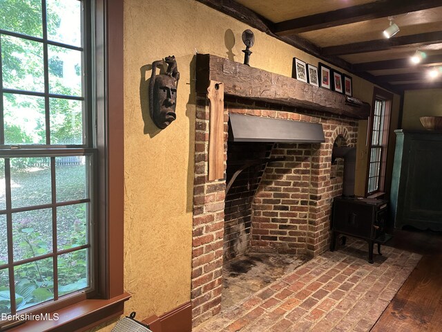 room details featuring beamed ceiling