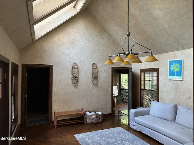 unfurnished living room with dark hardwood / wood-style flooring and a skylight