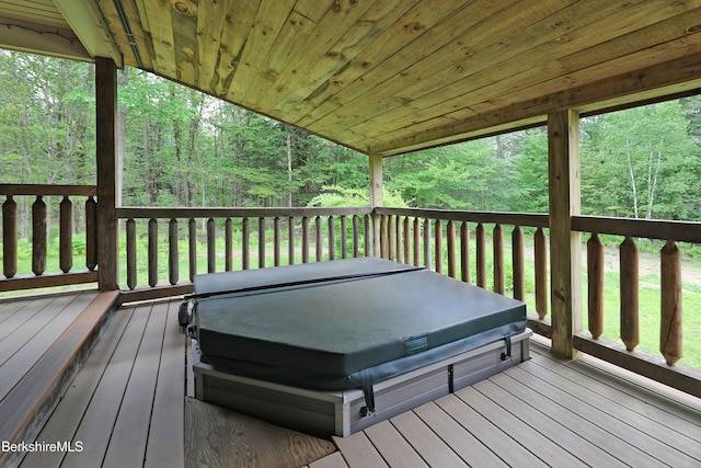 289 Algerie Rd, Becket, MA 01223 - deck featuring a covered hot tub and a wooded view