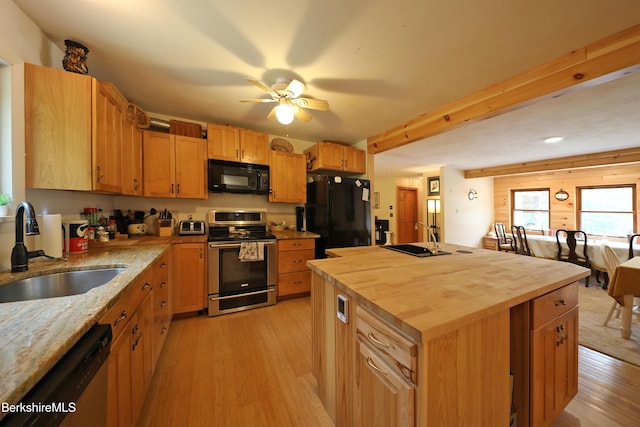 289 Algerie Rd, Becket, MA 01223 - kitchen with black appliances, wooden counters, light wood-type flooring, a ceiling fan, and a kitchen island