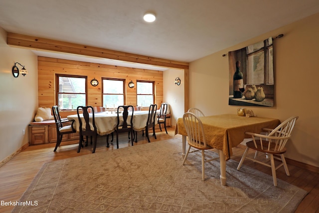 289 Algerie Rd, Becket, MA 01223 - dining space with wood finished floors, healthy amount of natural light, wooden walls, and beamed ceiling
