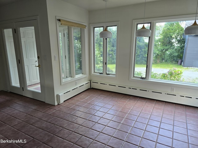 unfurnished sunroom with a baseboard radiator