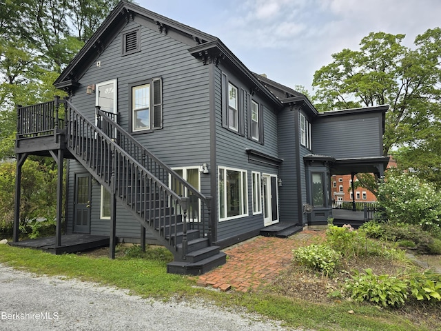 exterior space featuring a wooden deck