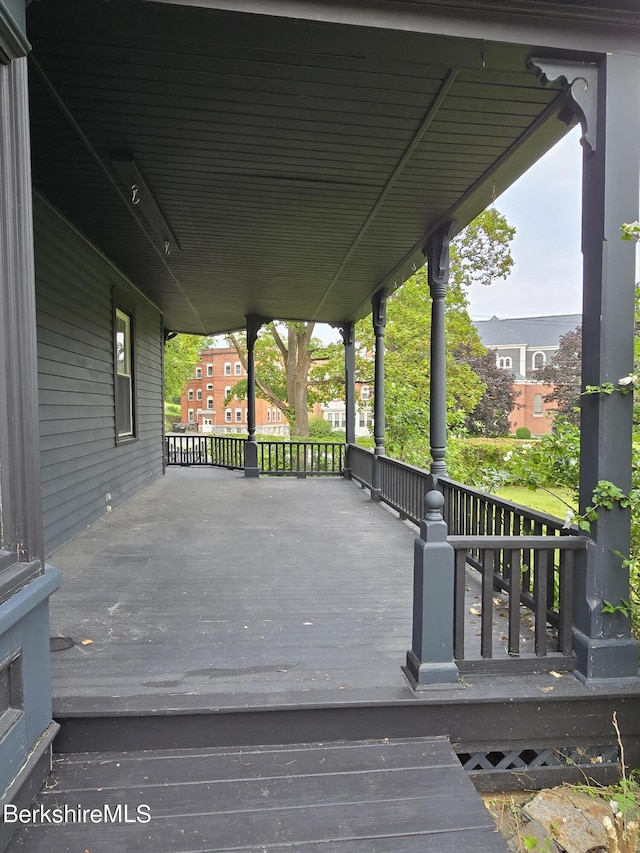 wooden terrace featuring a porch