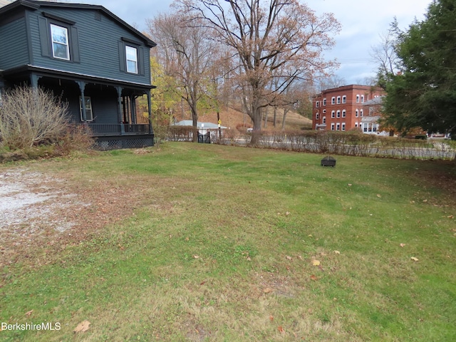 view of yard featuring a porch