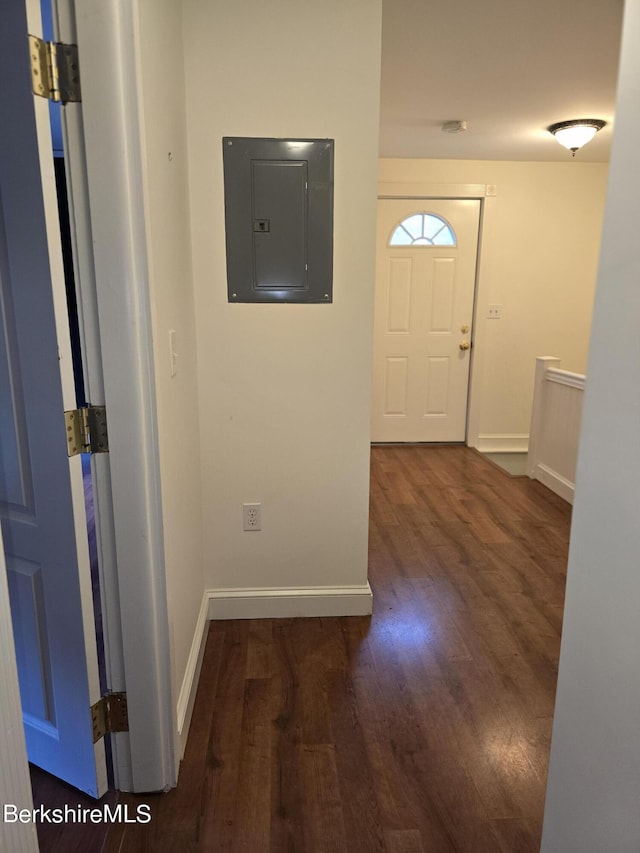 entrance foyer with electric panel and dark hardwood / wood-style floors