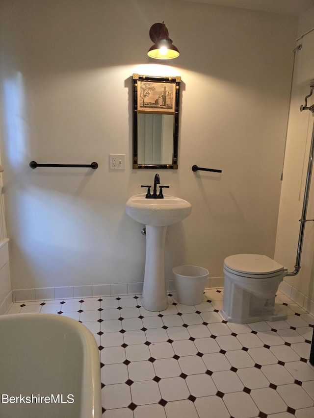 bathroom featuring toilet