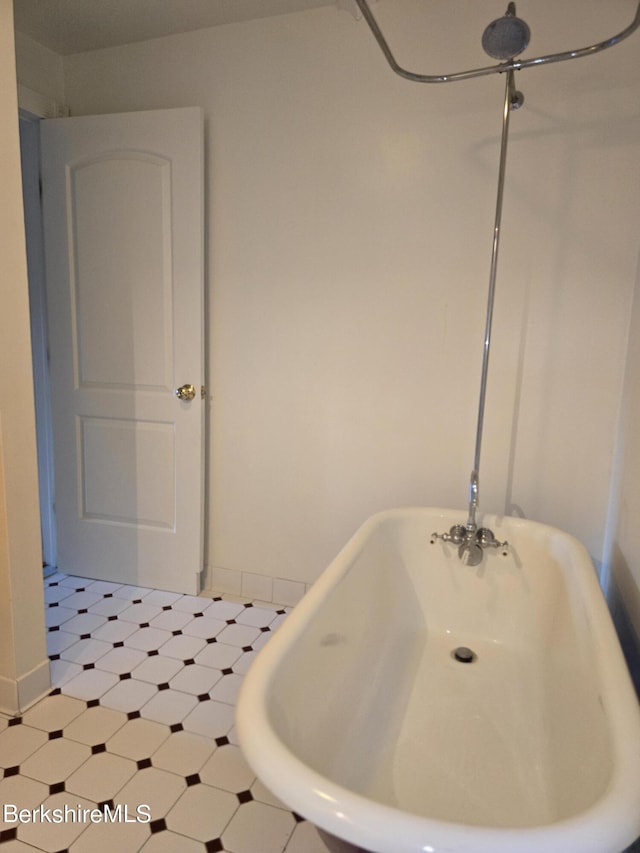 bathroom with a tub to relax in