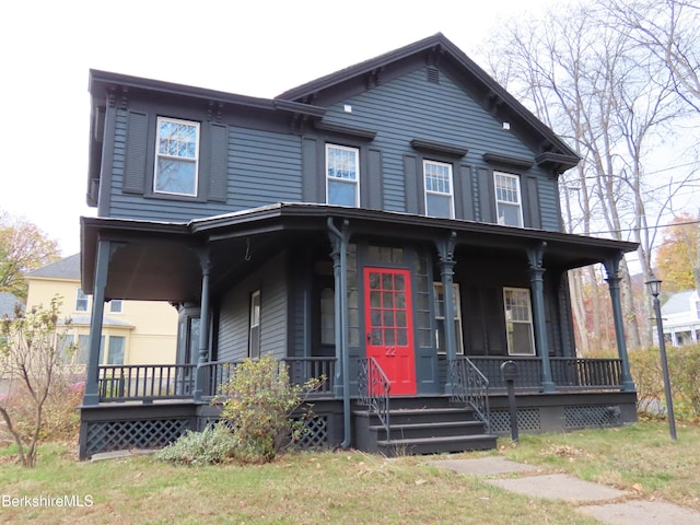view of front of home featuring covered porch