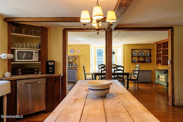 interior space featuring dark hardwood / wood-style flooring, radiator, and a chandelier