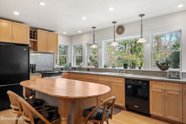 2017 Monterey Rd, Otis, MA 01253 - kitchen with black appliances, healthy amount of natural light, light brown cabinets, recessed lighting, and light wood-style floors