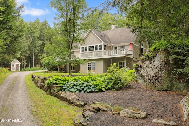 2017 Monterey Rd, Otis, MA 01253 - view of front of house with a shed, a chimney, and a deck