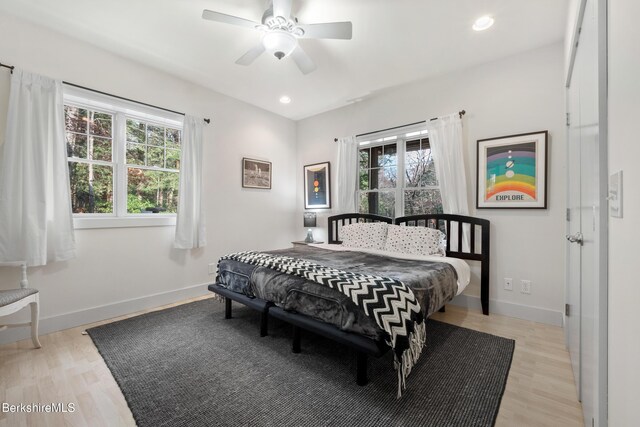 2017 Monterey Rd, Otis, MA 01253 - bedroom featuring multiple windows, light wood-style flooring, recessed lighting, and ceiling fan